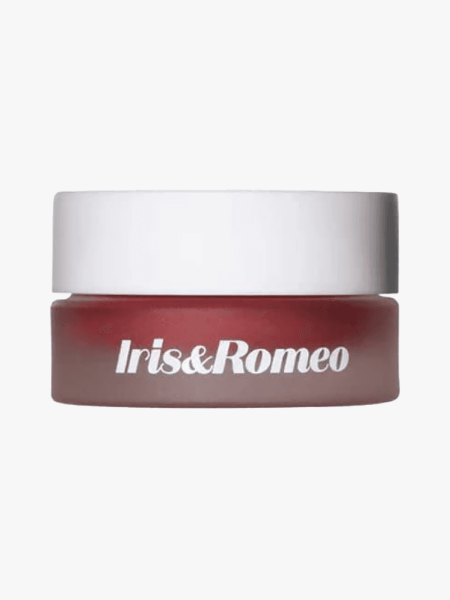 Iris and Romeo Power Peptide Lip Balm in branded tub component on a light gray background